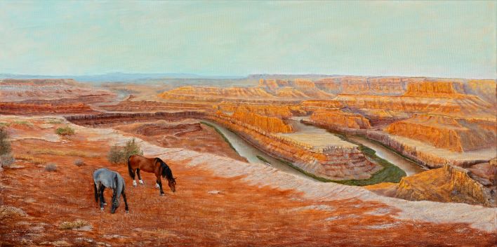 Limited edition canvas print of a western landscape painting showing two horses grazing.