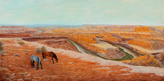 Limited edition canvas print of a western landscape painting showing two horses grazing.