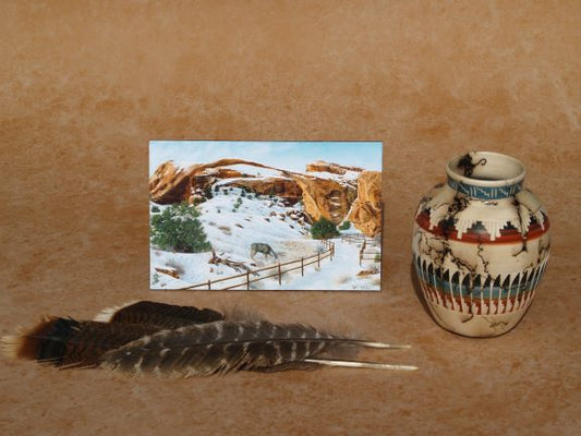 Western art mini panel by Ted Sorensen depicting a snowy desert arch with a horse beside a decorated Native American pottery vase