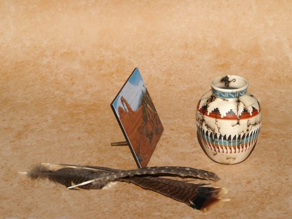 Ted Sorensen Western wildlife art mini panel displayed with decorative vase and feathers on tan background